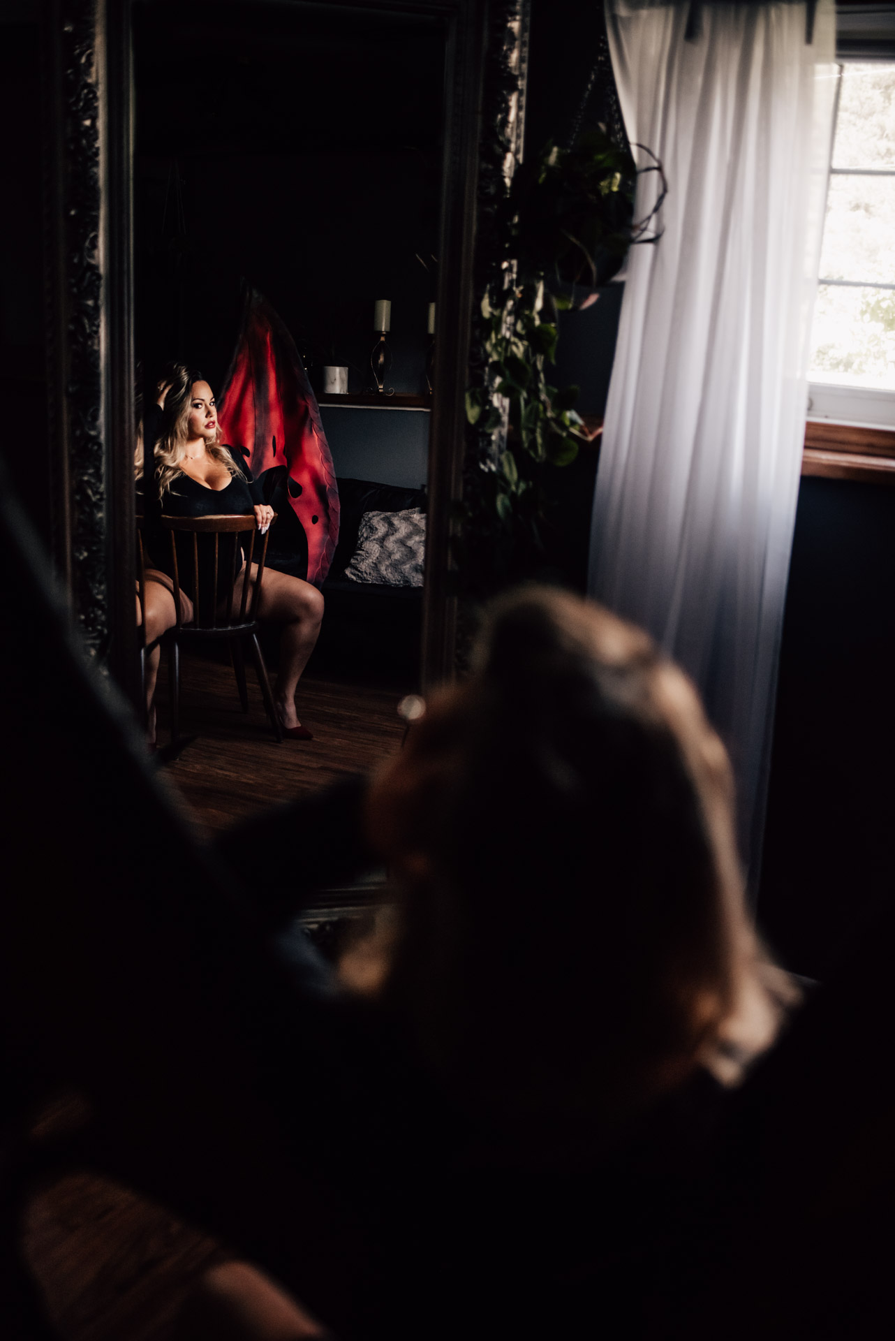 woman in devil wings for ottawa boudoir session