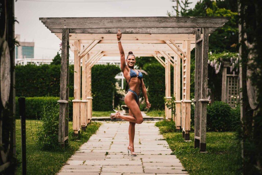 Ottawa Body Building competitor posing at Algonquin college gardens for photoshoot